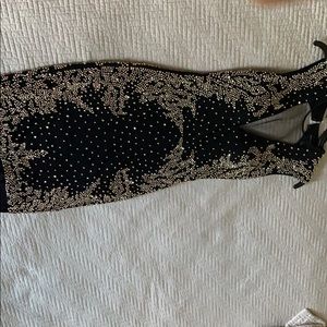 Black dress with golden beads